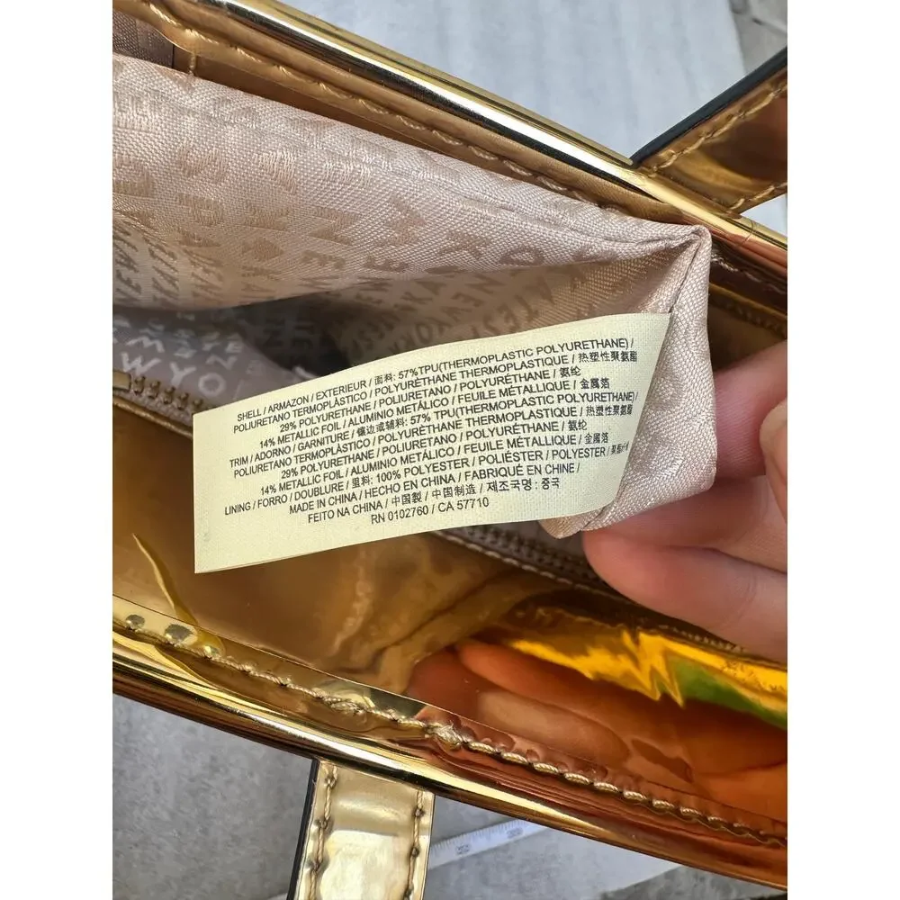 Kate Spade Metallic Gold Perforated Spade Logo Tote Bag